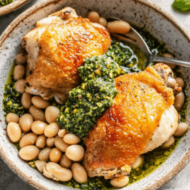 One-Pan Crispy Chicken with Cannellini Beans and Pistachio Pesto