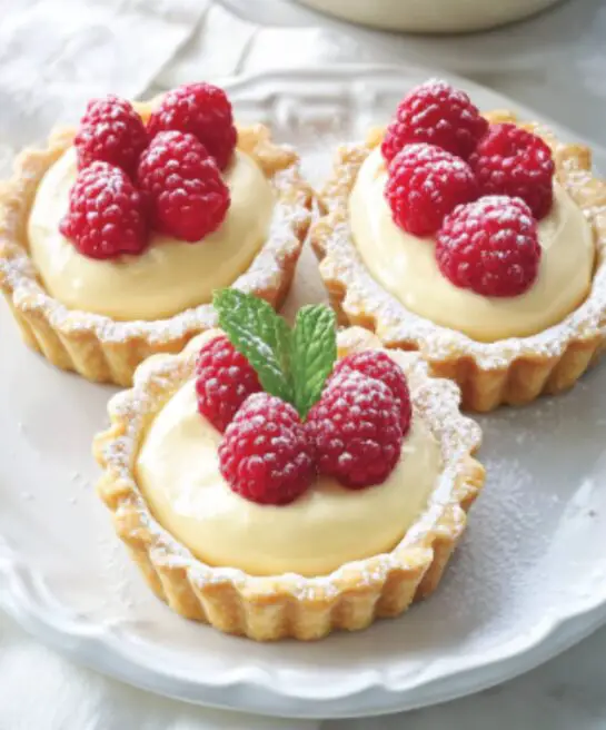 Vanilla Cream Tarts with Fresh Raspberries