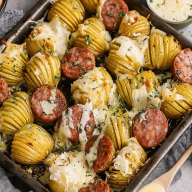 Kielbasa Sheet Pan Dinner with Cheesy Hasselback Potatoes